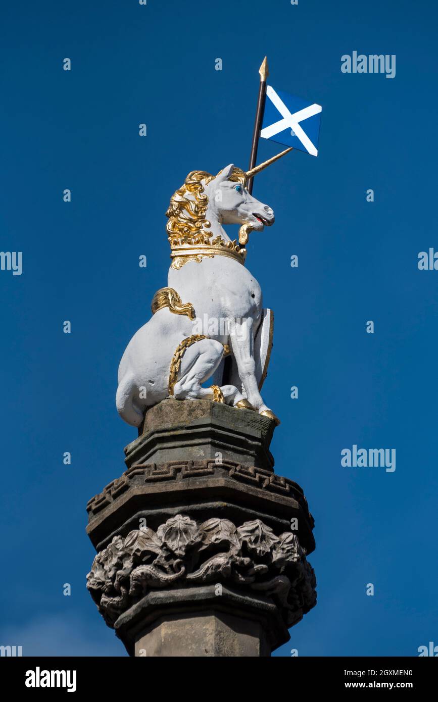 Statue of a unicorn, the national animal of Scotland, on top of the Mercat Cross in Parliament Square in Edinburgh's Old Town. Stock Photo