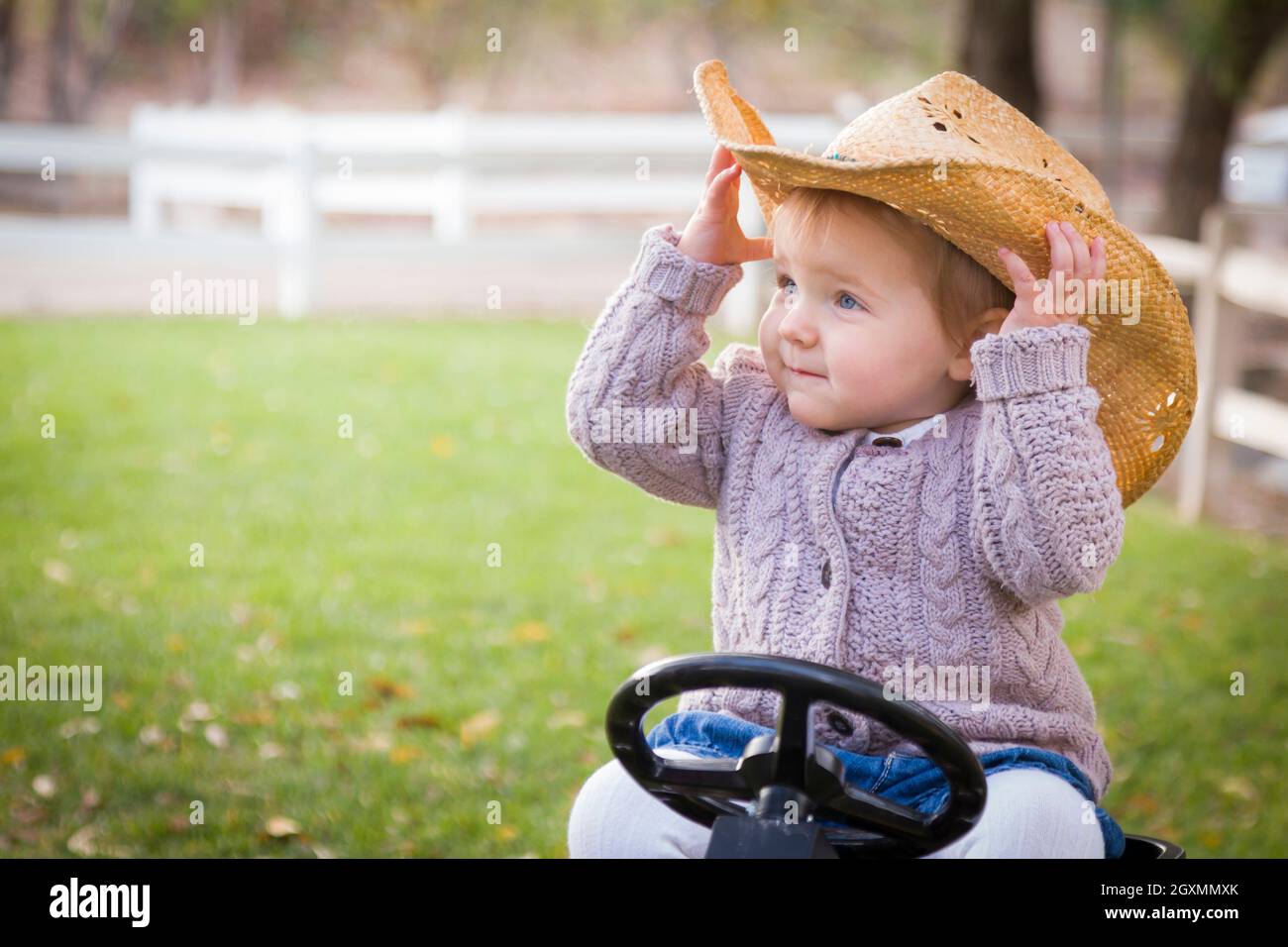 Happy Young Toddler Wearing Cowboy Hat 