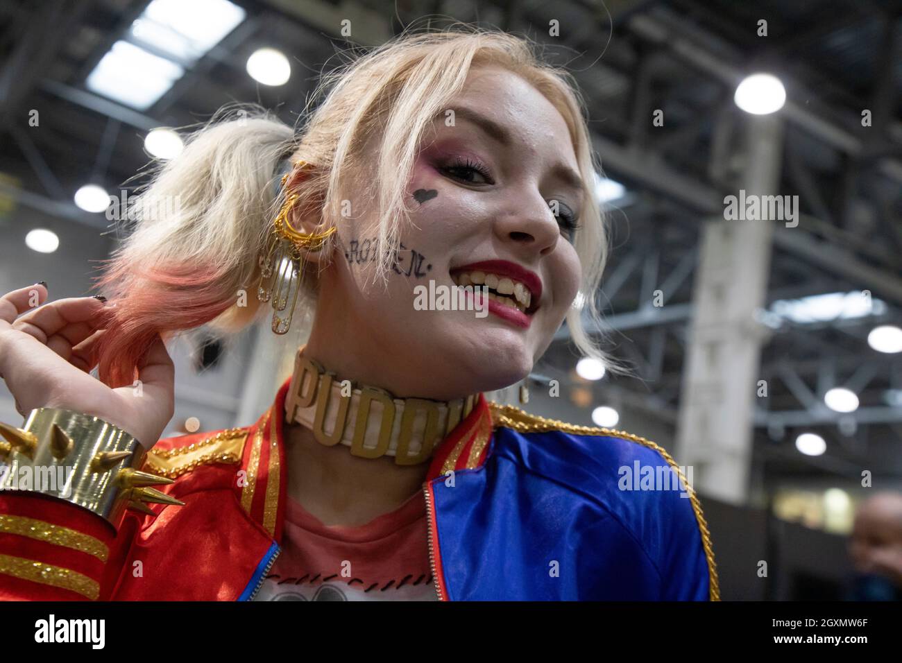 Moscow, Russia. 4th October, 2019 Young girl in the image of the Harley Quinn character of the movie Suicide Squad takes part of the Comic Con Russia 2019 and  the 2019 Igromir computer and video games exhibitions at the Crocus Expo International Exhibition Center in Moscow region, Russia Stock Photo