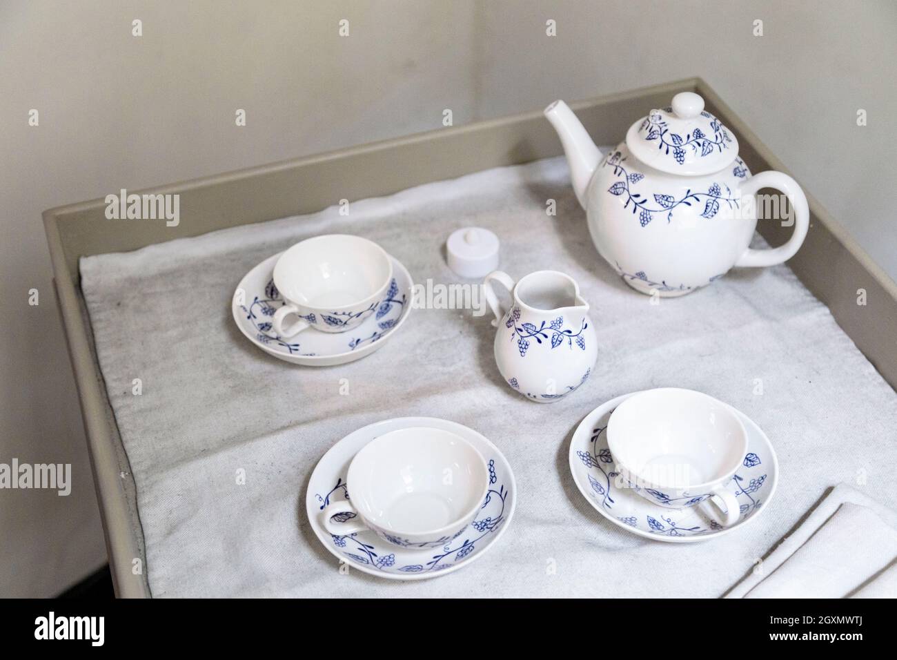 A tray with tea cups and tea pot inside Benjamin Franklin House in Charing Cross, London, UK Stock Photo
