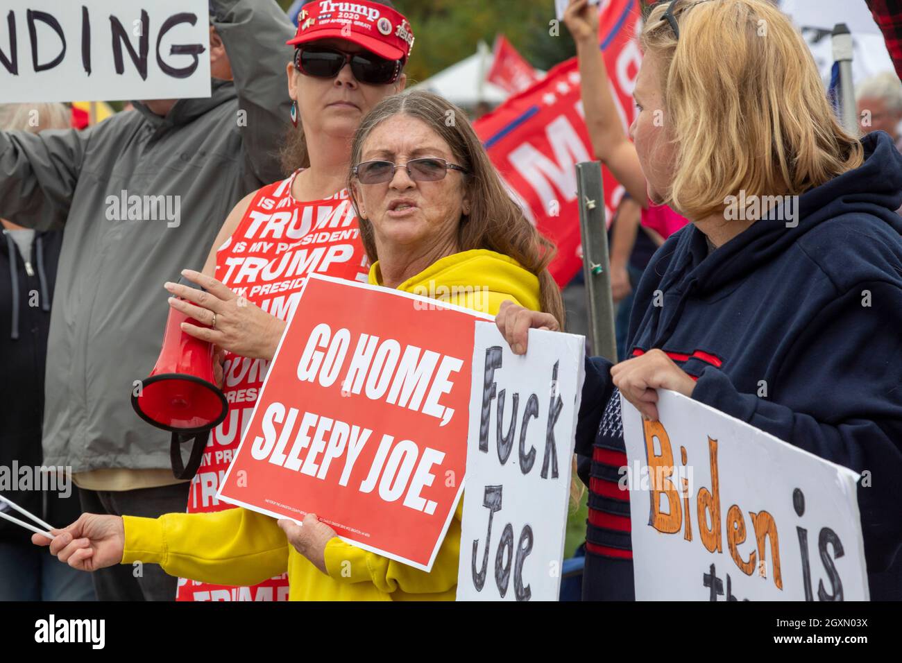 Howell, Michigan, USA. 5th Oct, 2021. Republicans protest as President Joe Biden visits Michigan to promote his Build Back Better Plan. Biden's plan includes money to fight climate change and to lift children out of proverty. The Livingston County Republic Party called its protest the 'Stop the Spending Rally.' Credit: Jim West/Alamy Live News Stock Photo