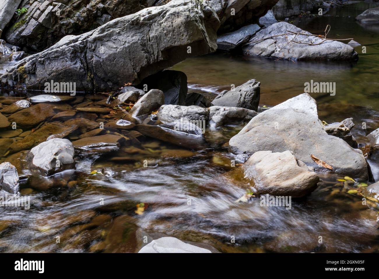rocks with cascading water Stock Photo - Alamy