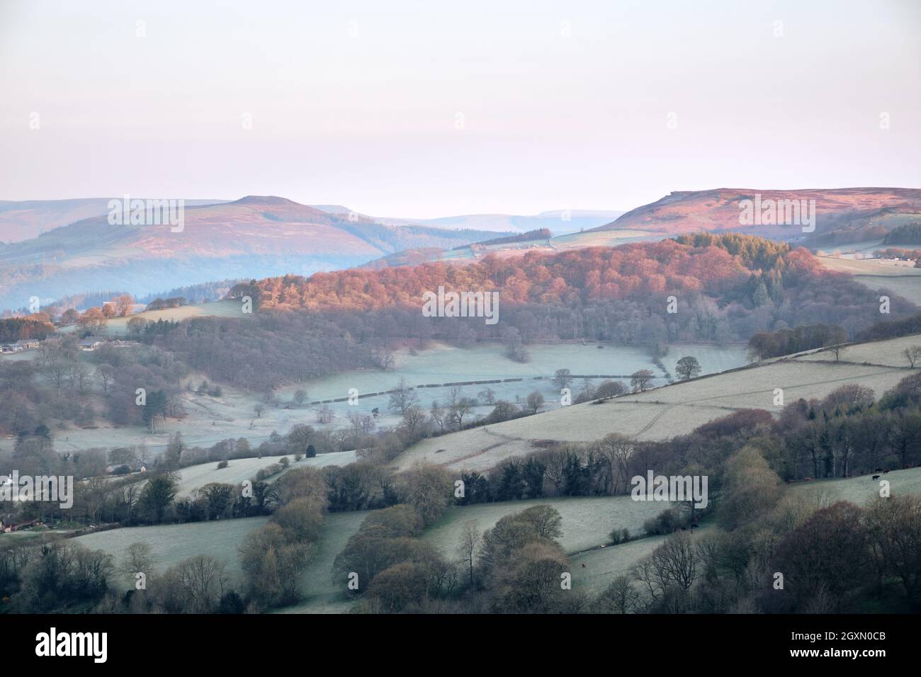 Dawn light over Burbage Edge and Win Hill, Peak District, UK Stock Photo