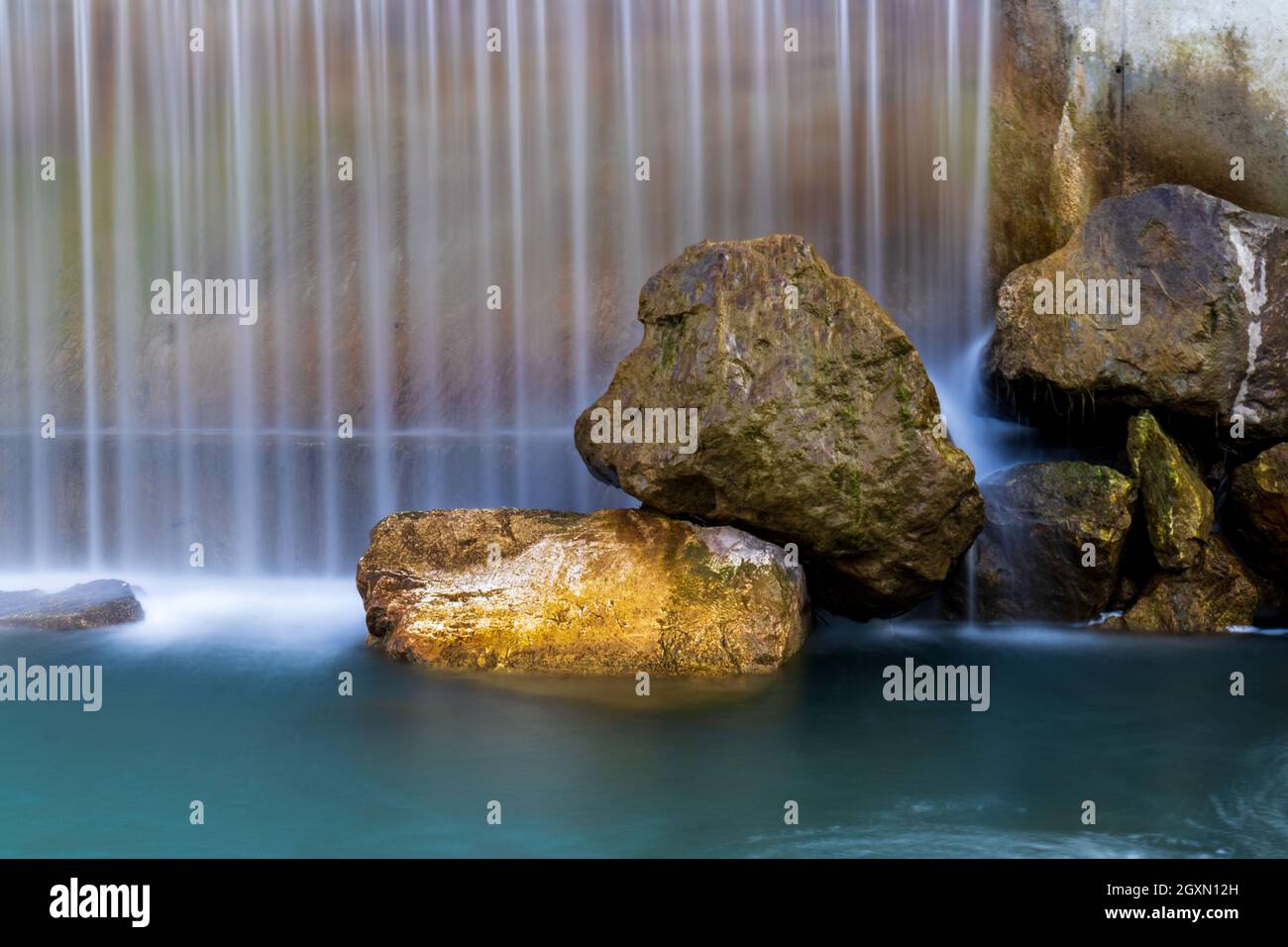 rocks with cascading water Stock Photo - Alamy