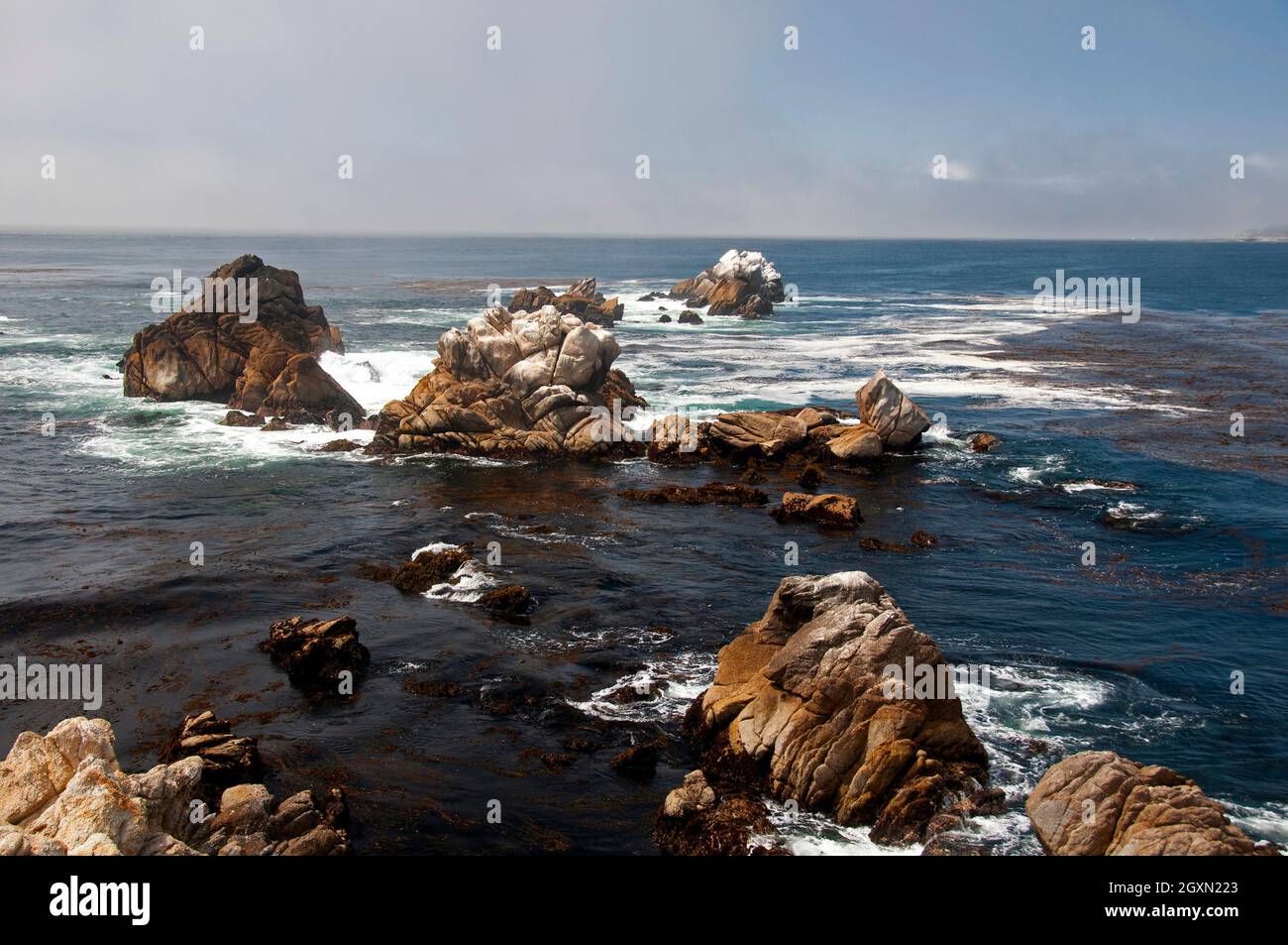 Rocks at WhalerÕs Cove coastal trail at the Point Lobos State Natural Reserve, California, USA Stock Photo