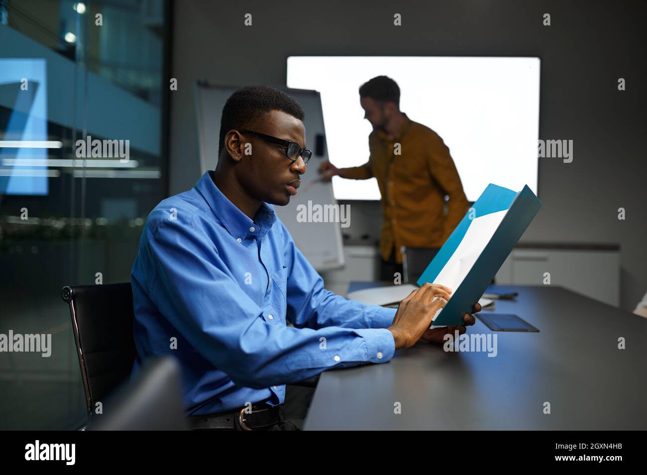 Two managers, IT idea presentation in office Stock Photo