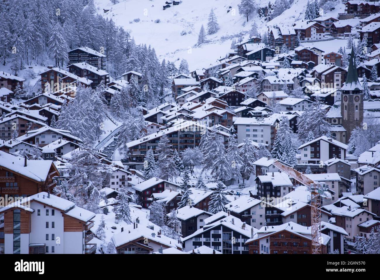 landscape of Zermatt valley and matterhorn peak with fresh snow in