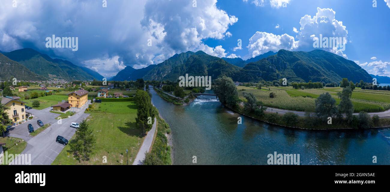 view of the northern part of the Lake Idro  with the river tributary Chiese, in the municipalities of Ponte Caffaro, Brescia, Italy Stock Photo