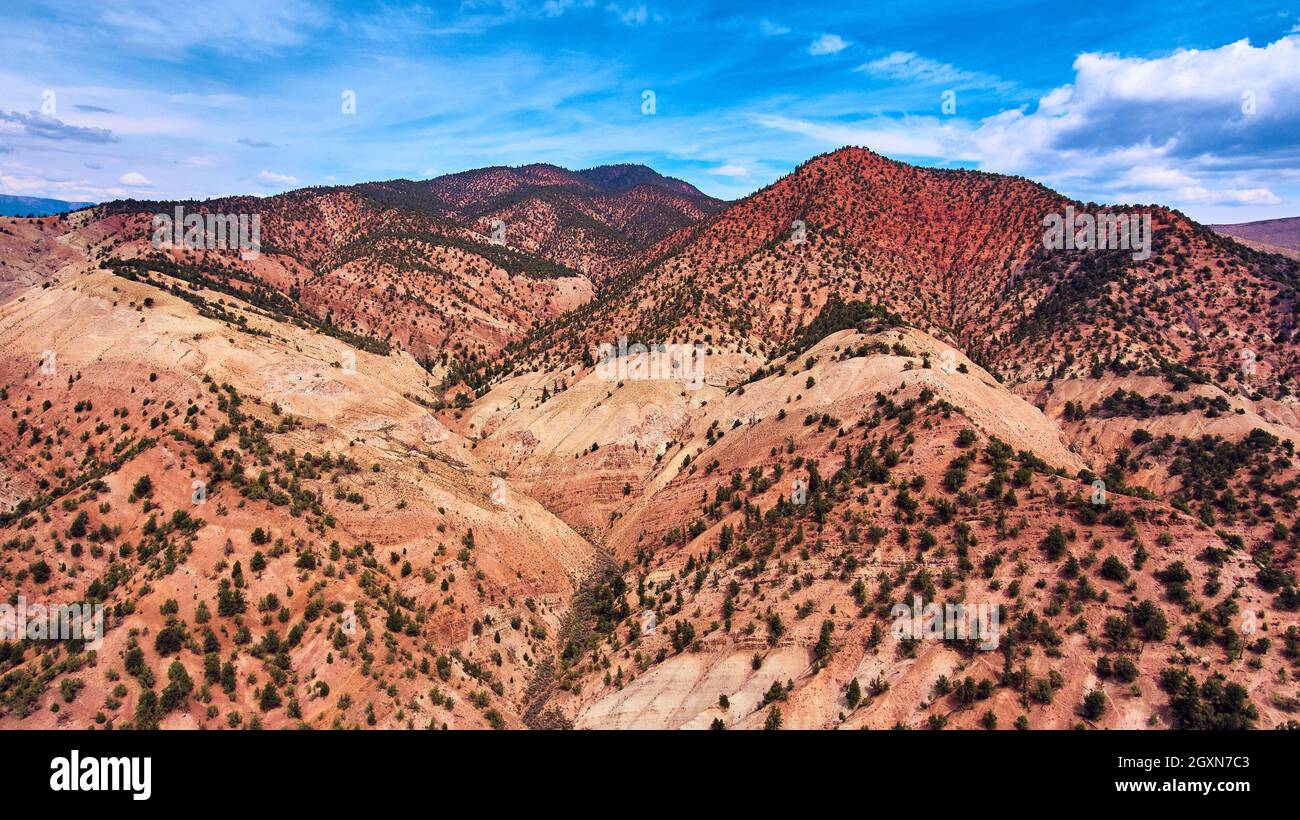 Colorado mountains covered in green shrubs and sand Stock Photo Alamy