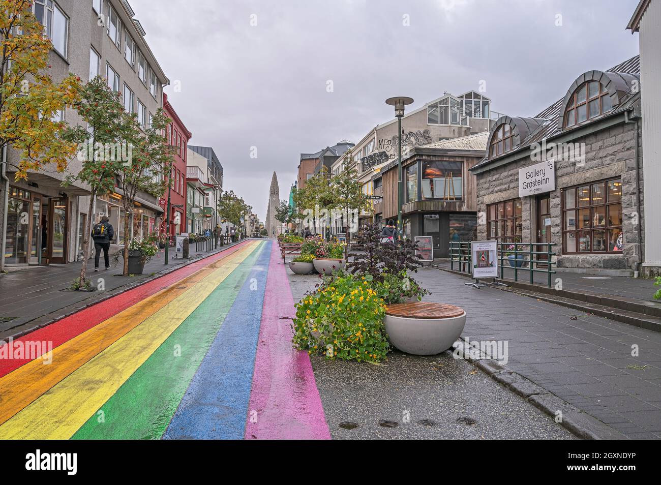 Reykjavik, Iceland – September 22, 2021:  Downtown street with a rainbow flag painted on the pavement Stock Photo