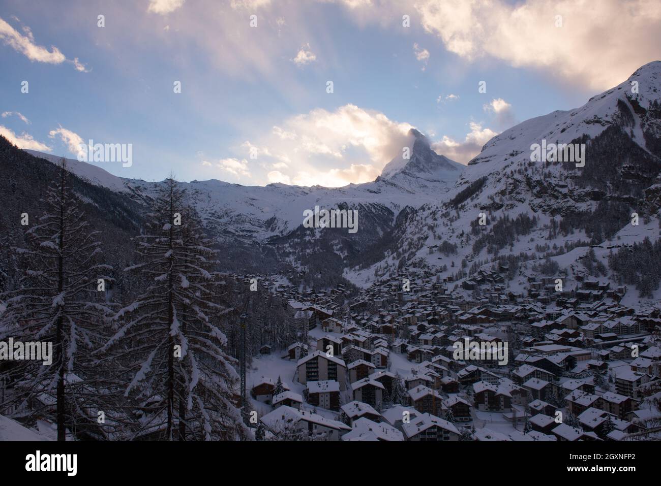 aerial view on zermatt valley and matterhorn peak at dusk with fresh ...