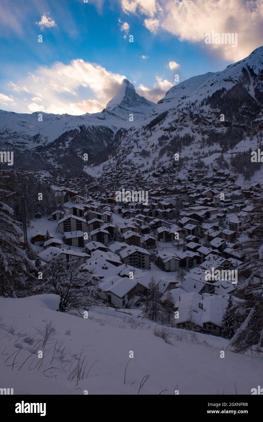 aerial view on zermatt valley and matterhorn peak at dusk with fresh ...