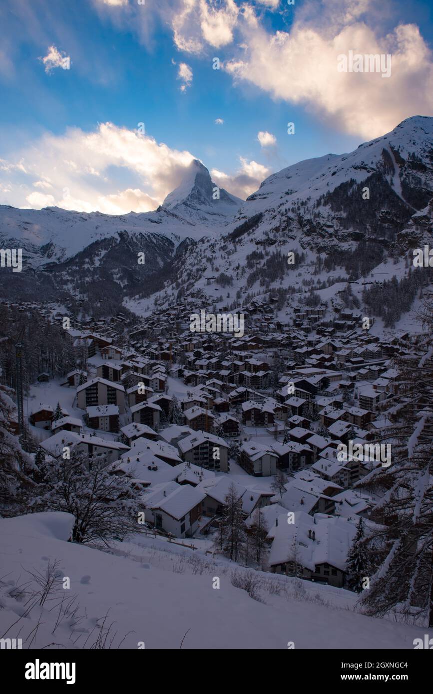 aerial view on zermatt valley and matterhorn peak at dusk with fresh ...