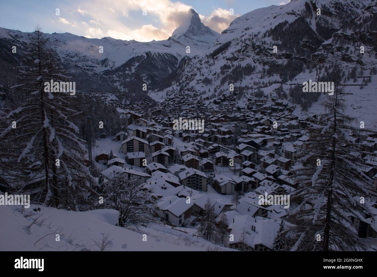 aerial view on zermatt valley and matterhorn peak at dusk with fresh ...