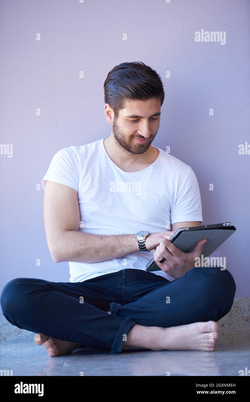 student working on tablet computer at university school modern interior Stock Photo