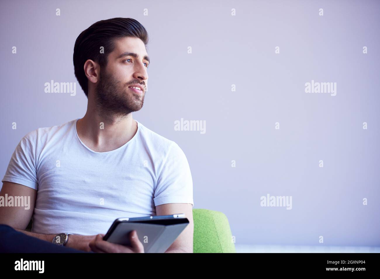 student working on tablet computer at university school modern interior Stock Photo