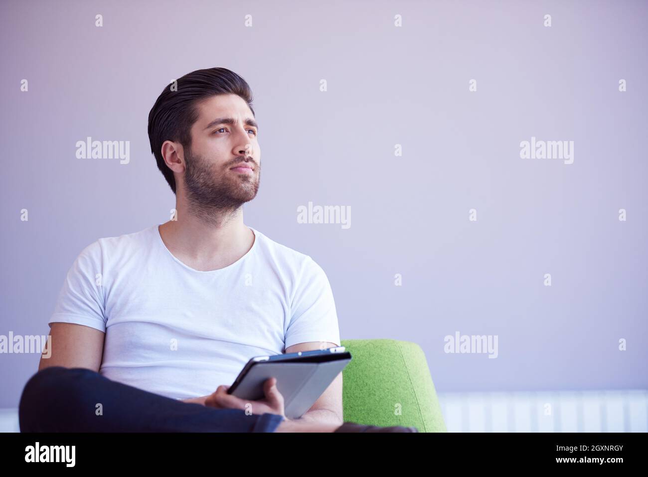 student working on tablet computer at university school modern interior Stock Photo