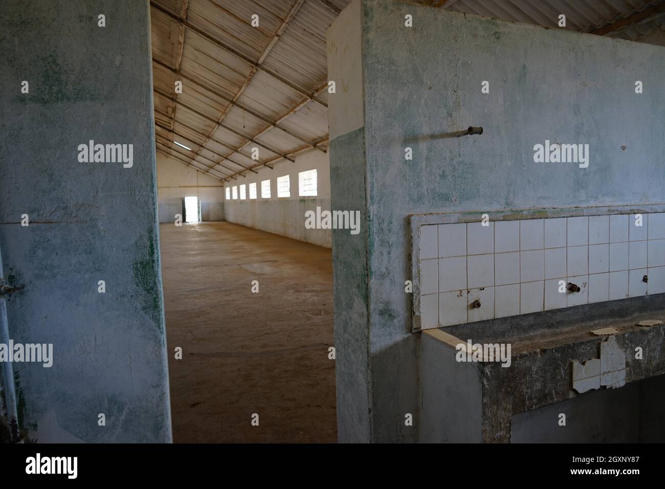 Communal cell, bathroom, Tarrafal concentration camp, Santiago Island, Republic of Cape Verde Stock Photo