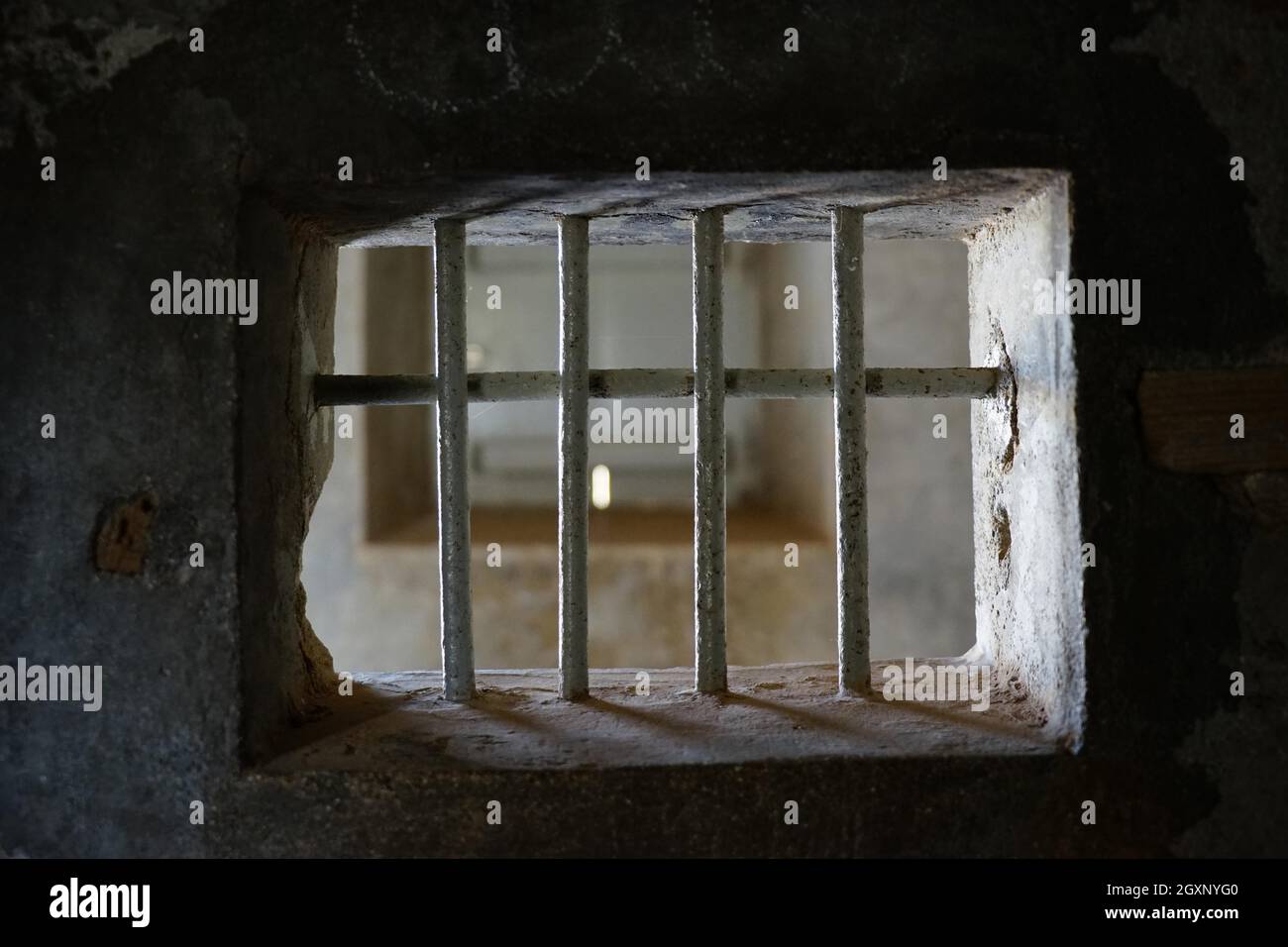 Barred window, Hollandinha, solitary cell, Tarrafal concentration camp, Santiago Island, Republic of Cape Verde Stock Photo