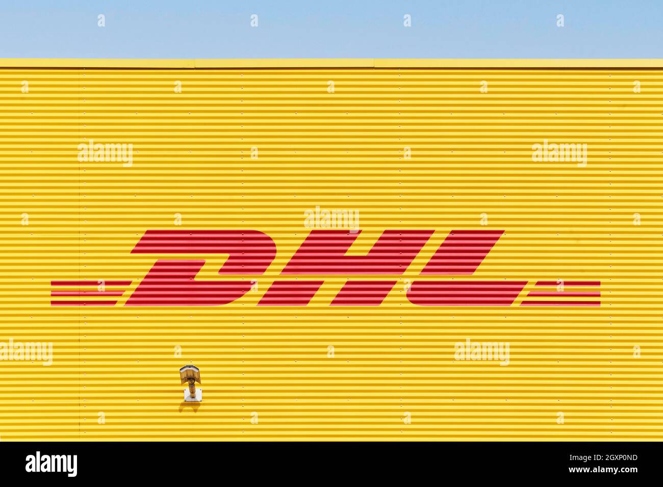 DHL, logo on warehouse, parcel and letter express service, Deutsche Post DHL  Group, Ratingen, North Rhine-Westphalia, Germany Stock Photo - Alamy