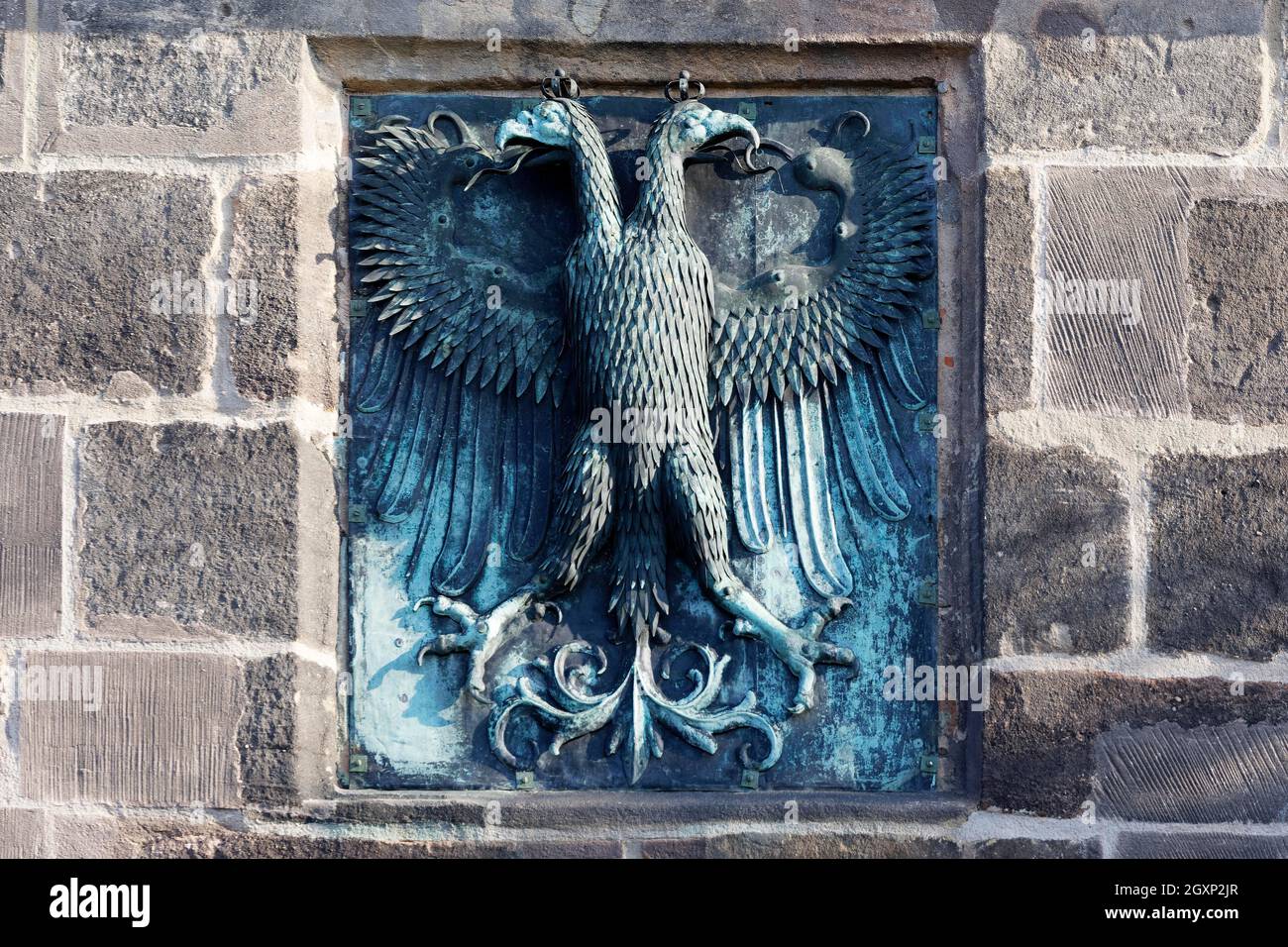 Coat of arms, eagle with two heads, double eagle, copper with patina, Tiergaertnerturm, Sebald old town, Nuremberg, Middle Franconia, Franconia Stock Photo