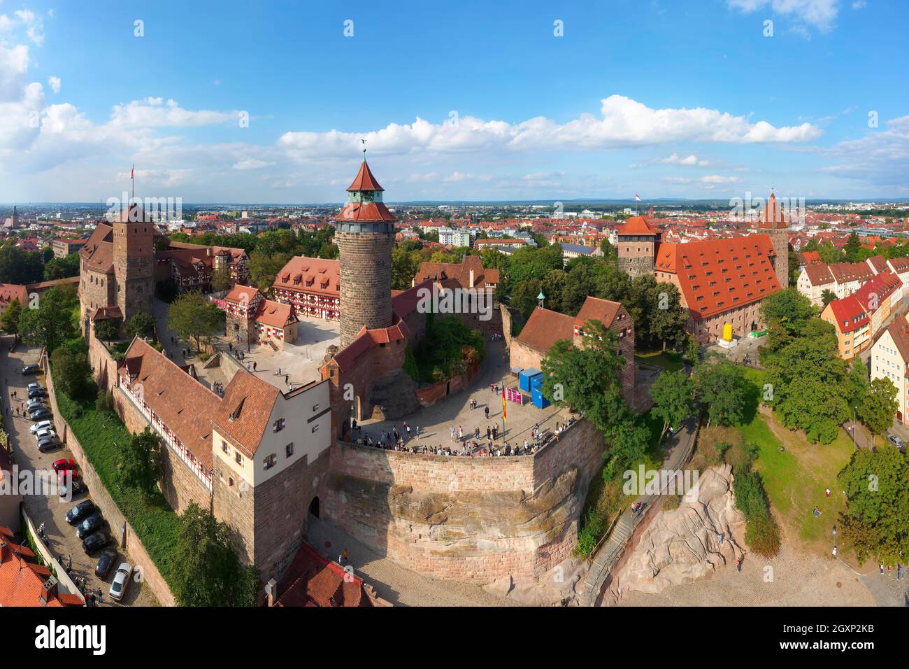 Aerial view, on the left Kaiserburg Nuremberg with Heidenturm, in the middle Sinwellturm, people on Freiung, behind Walpurgiskapelle, on the right Stock Photo