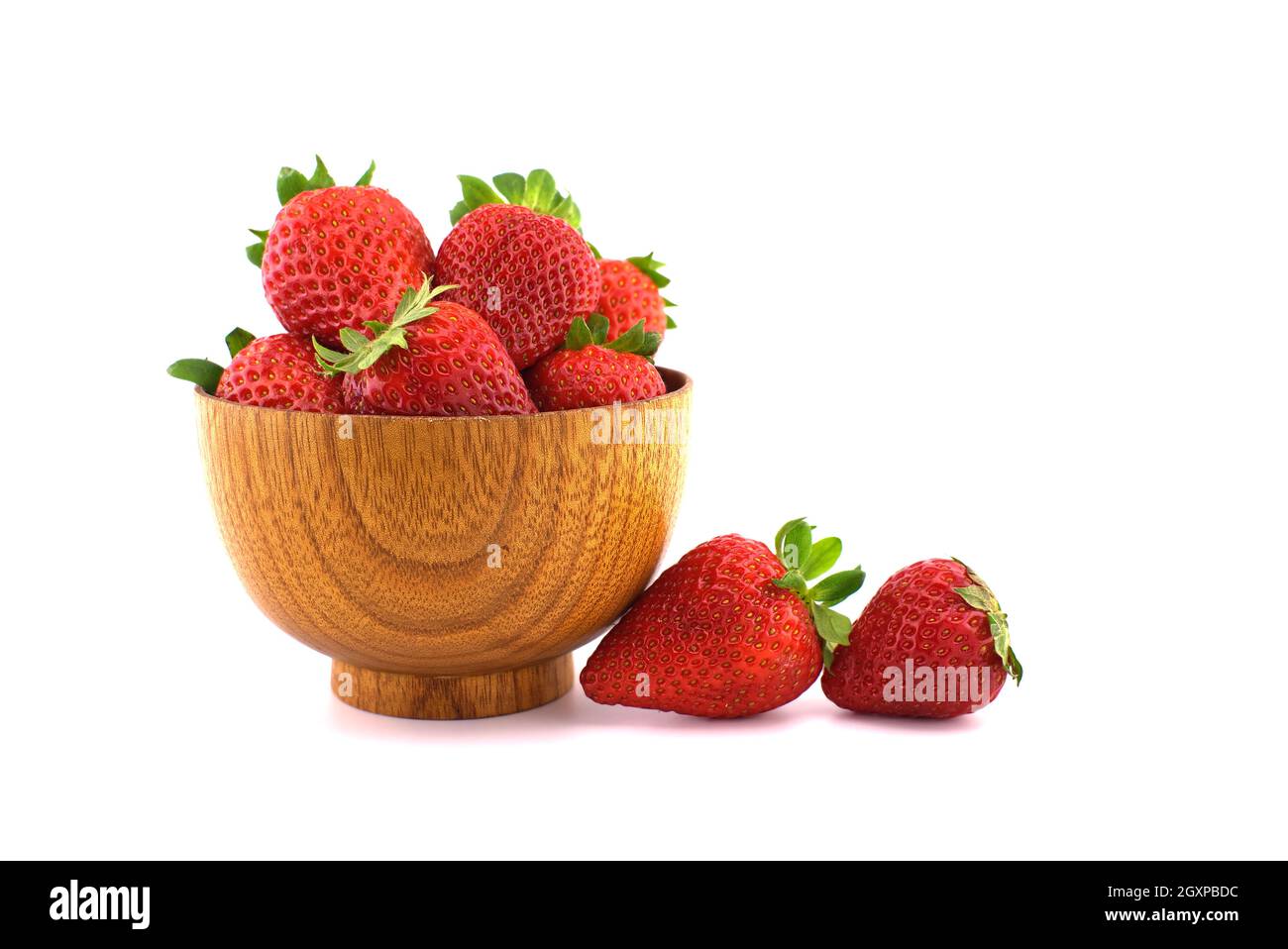 Garden strawberries in wooden bowl isolated on white background Stock ...