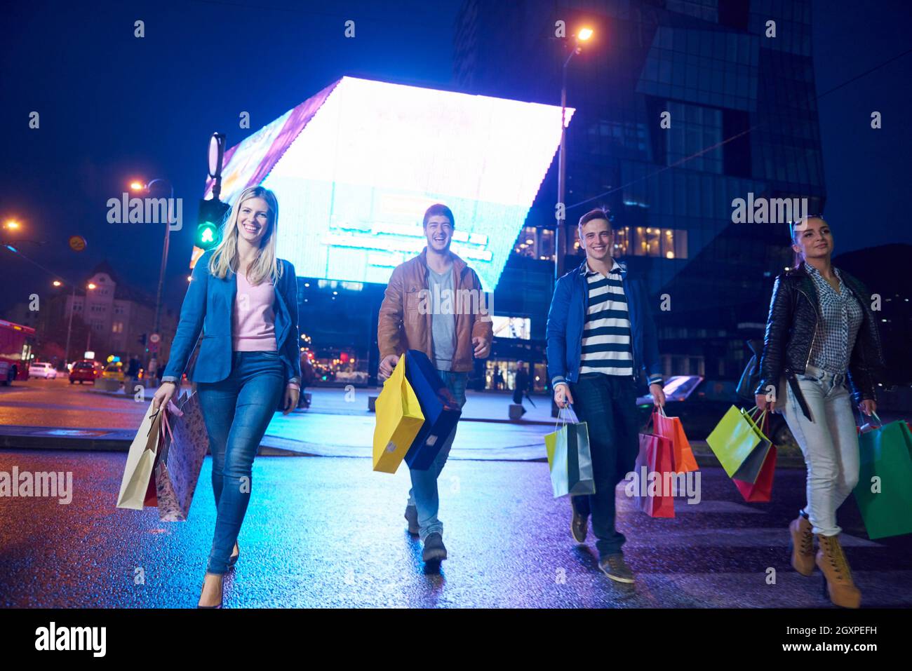 Group Of Friends Enjoying Shopping Trip Together group of happy young ...