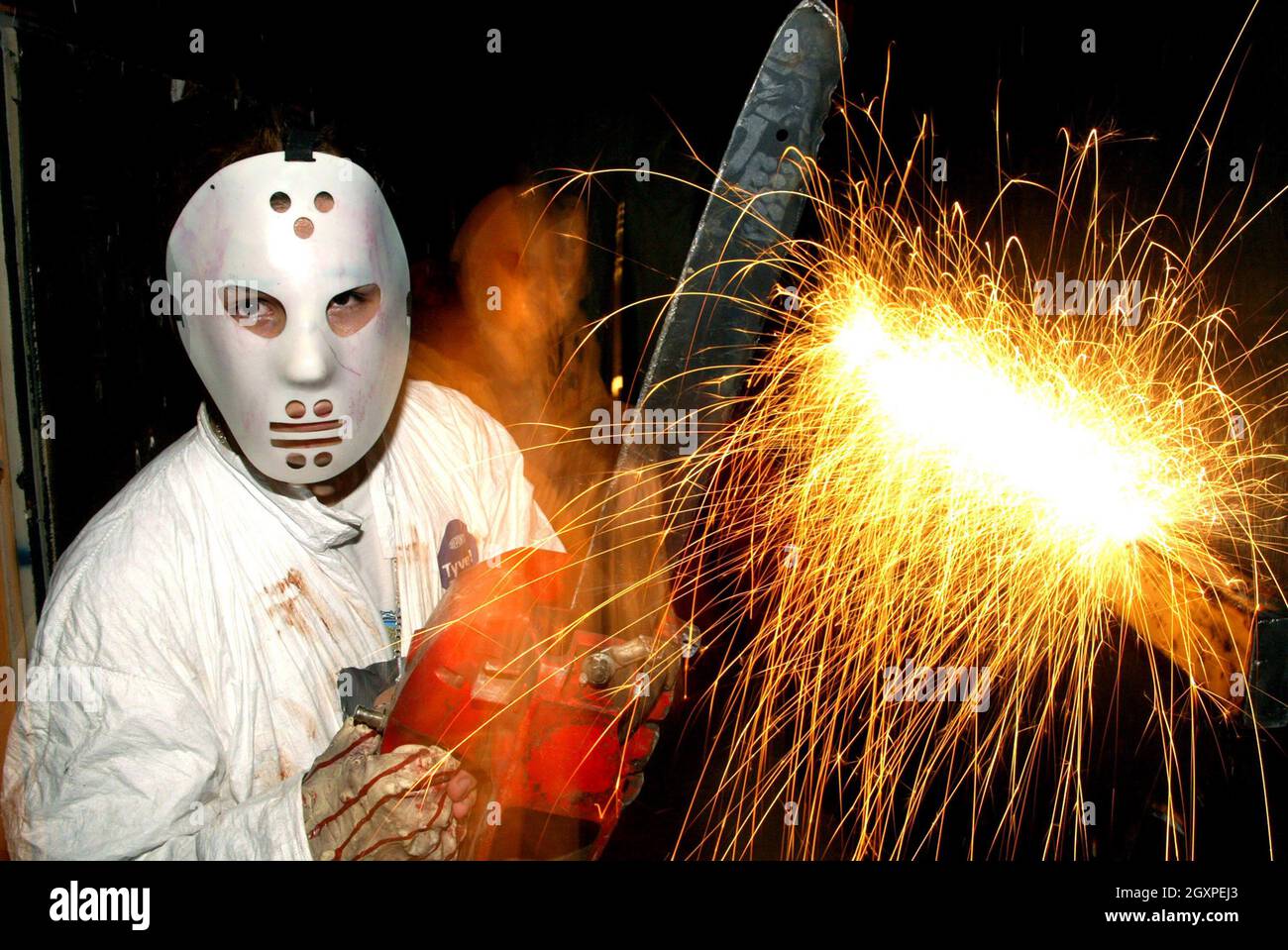 Chainsaw wielding maniac in Texas haunted house Stock Photo Alamy
