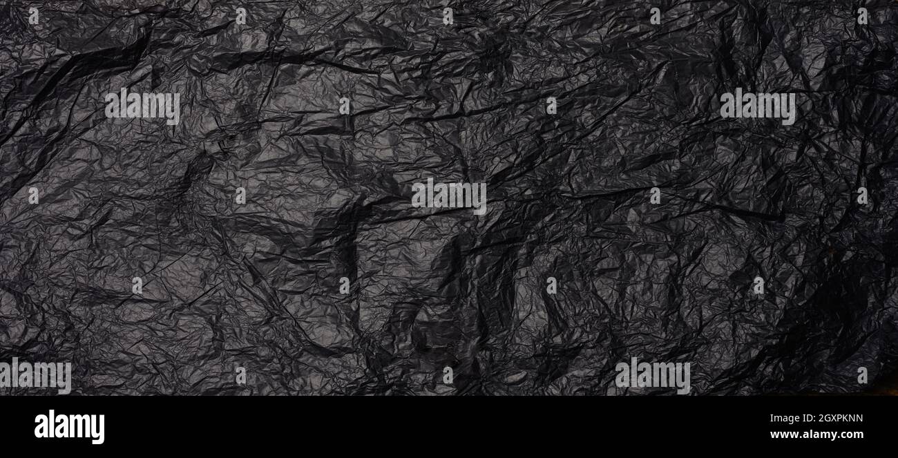 crumpled black paper, abstract texture background, banner Stock Photo