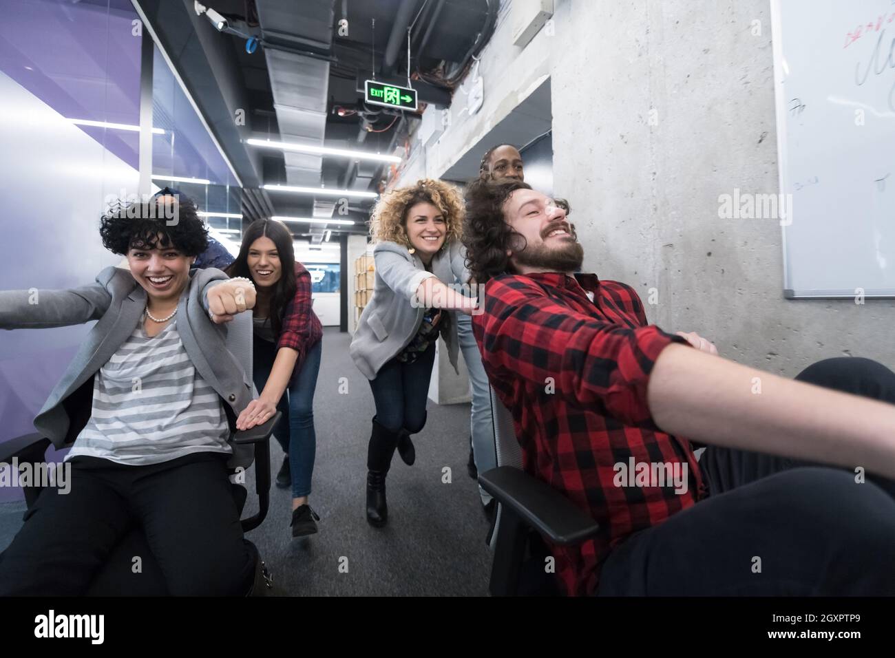 multiethnics startup business team of software developers having fun ...