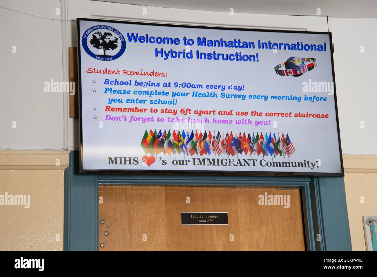Education High School electronic sign in hall of high school, welcoming students to hybrid learning during the Covid-19 pandemic Stock Photo