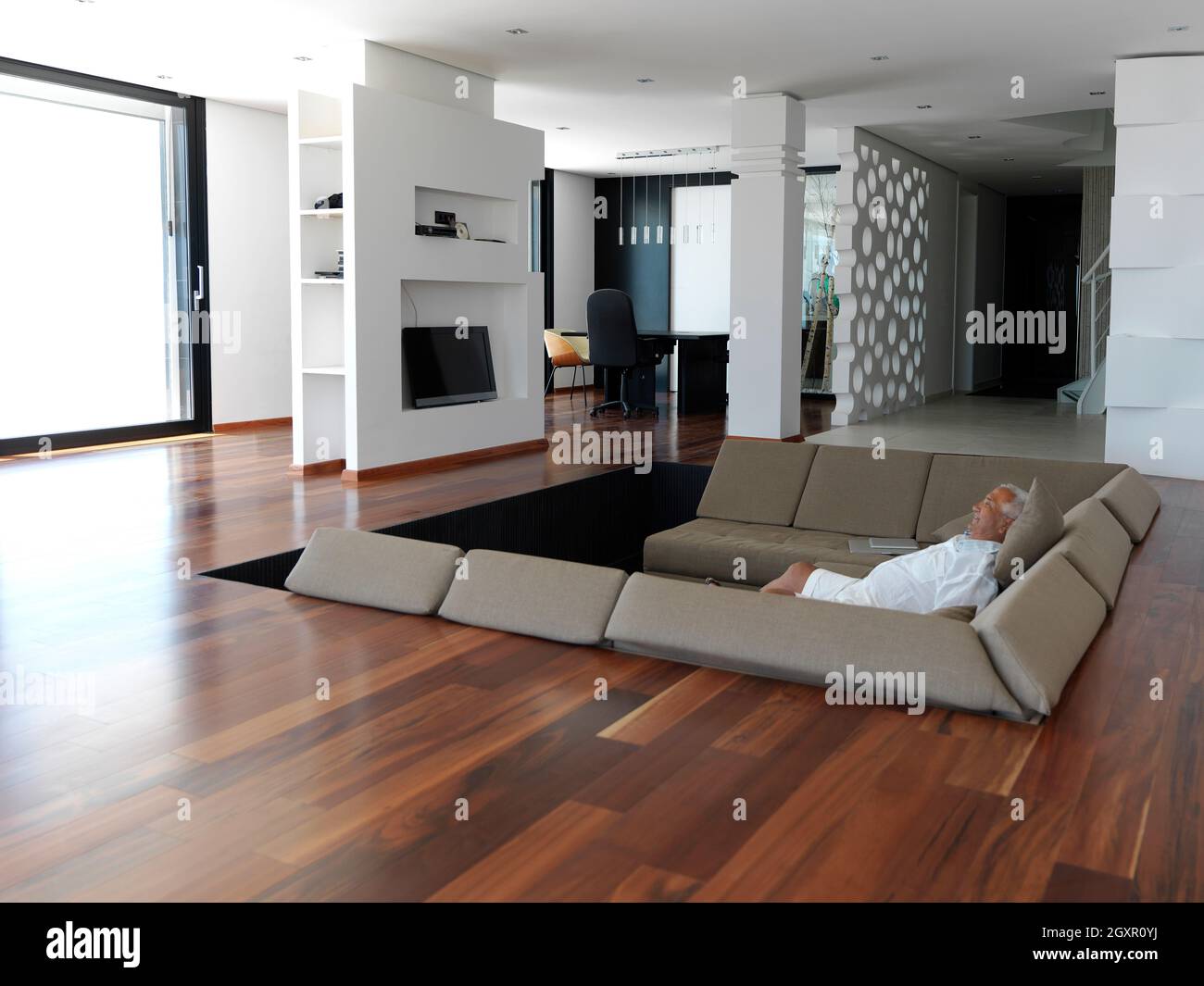 Portrait of senior man relaxing in sofa at home Stock Photo - Alamy