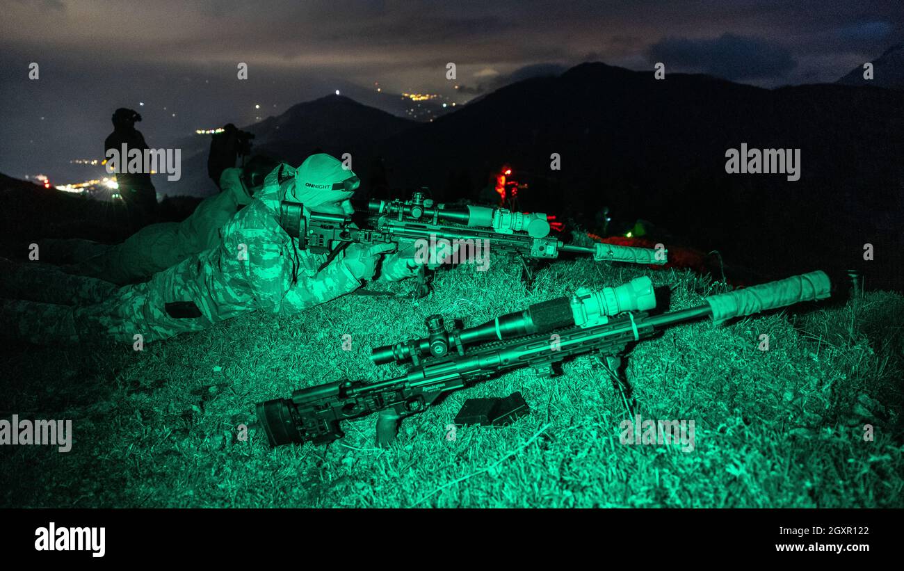 A Turkish Special Forces Sniper engages long range targets at night ...