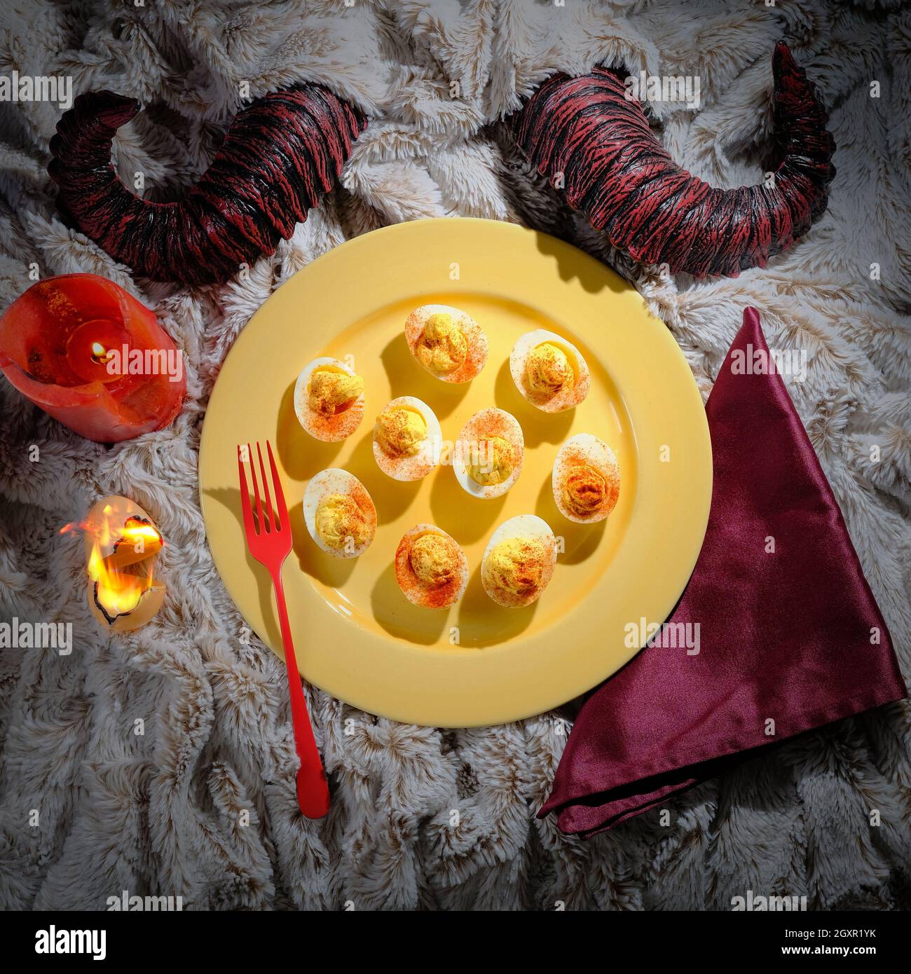 Satans recipe hellish deviled eggs with horns Stock Photo Alamy