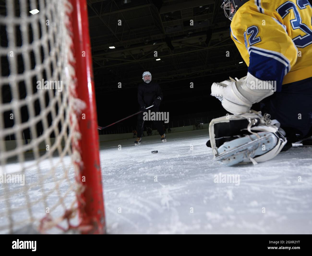 ice hockey goalkeeper player on goal in action Stock Photo Alamy