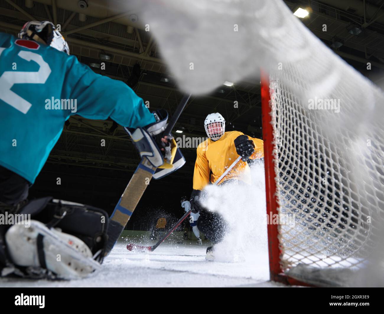 ice hockey goalkeeper player on goal in action Stock Photo Alamy