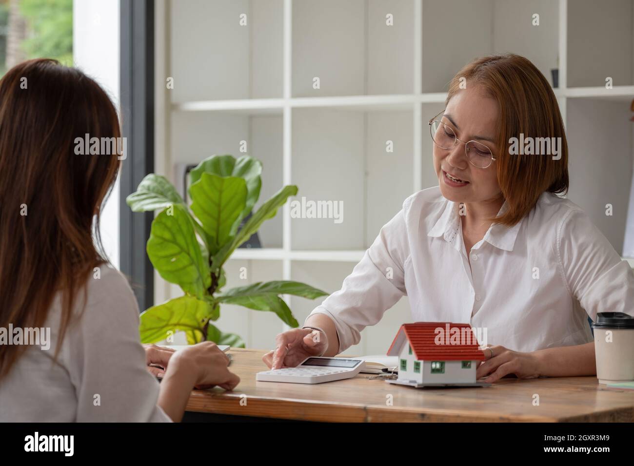 Real estate broker agent being analysis and making the decision a home