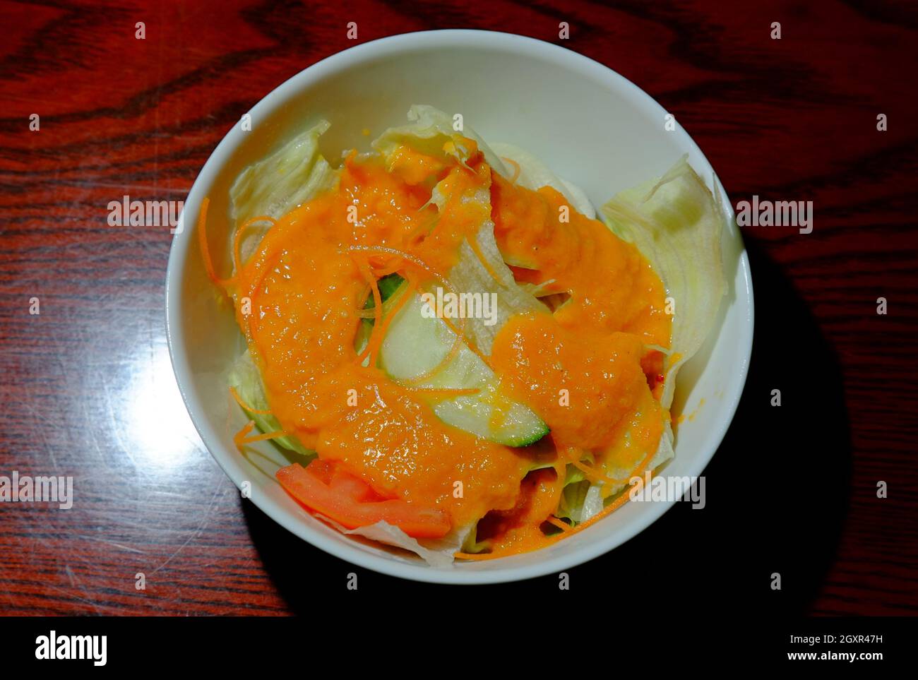 Japanese starter dish salad with orange dressing Stock Photo Alamy