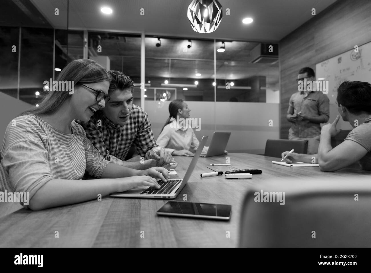 startup business people team brainstorming on meeting   working on laptop and tablet computer Stock Photo