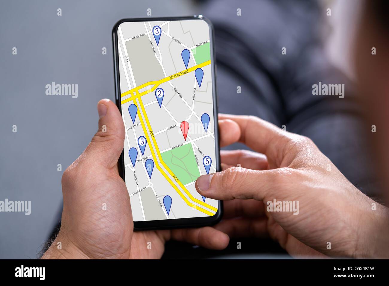 Mobile Phone GPS Navigator And Location Map Stock Photo - Alamy