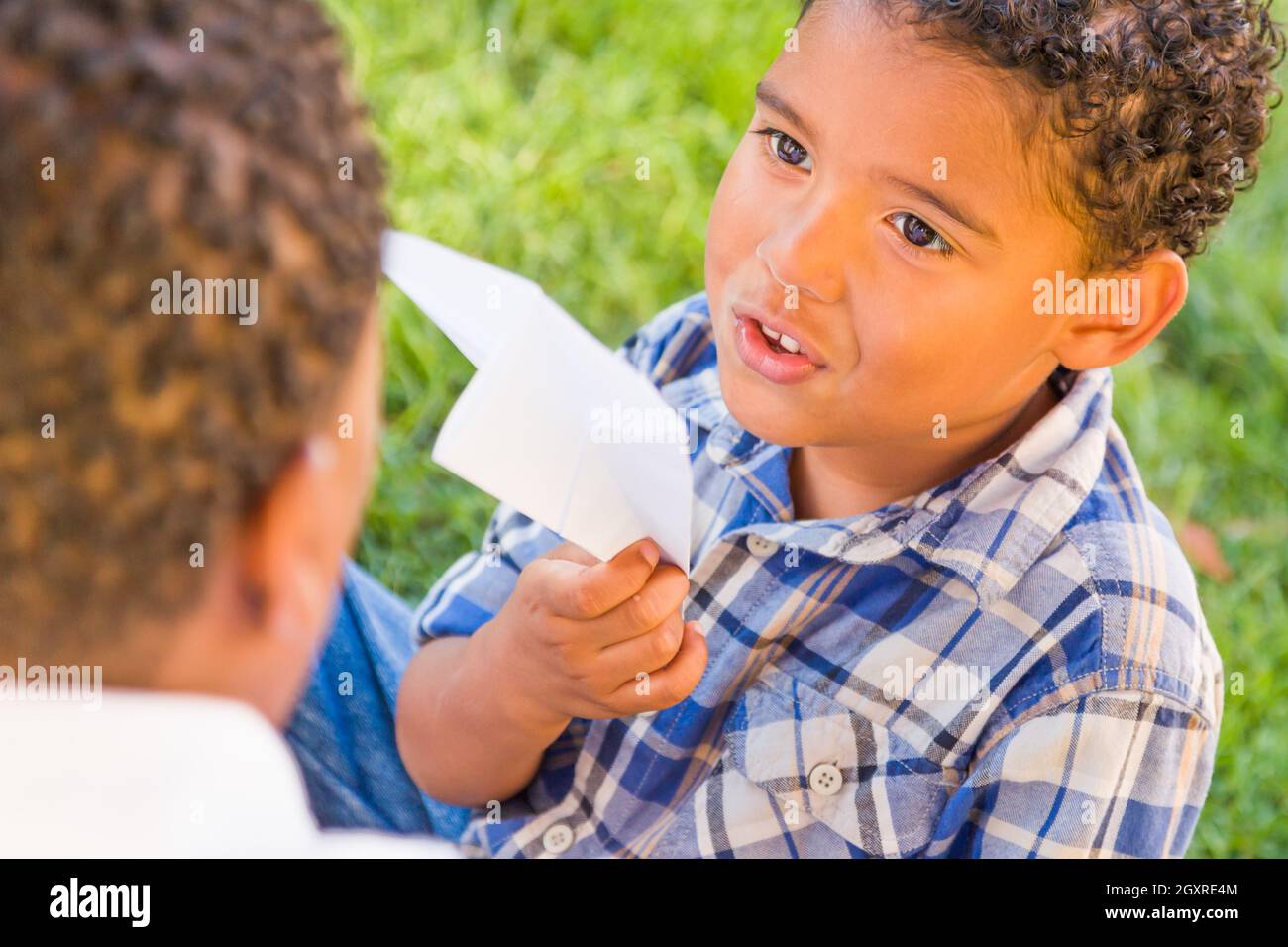 Happy African American Father and Mixed Race Son Playing with Paper ...