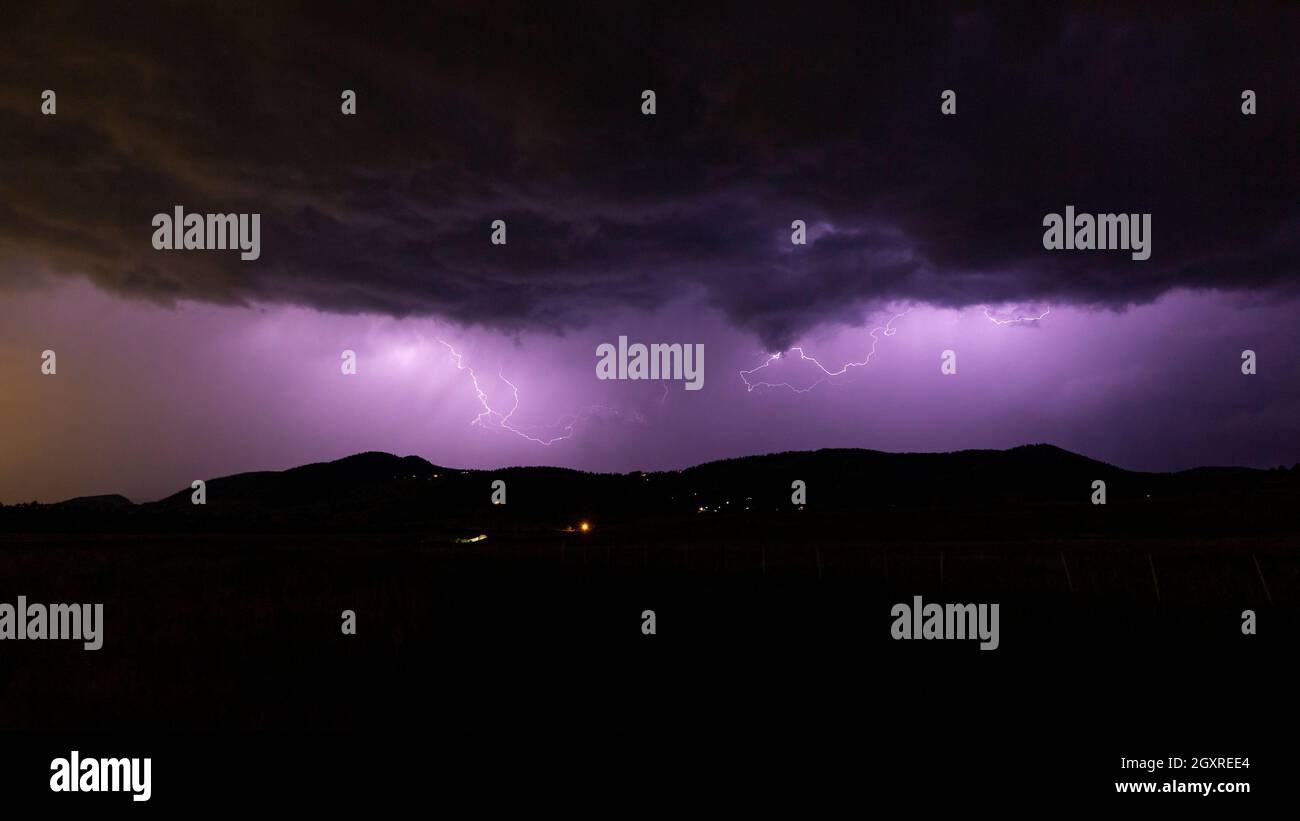 cloud to cloud lightning over foothills of Colorado, USA Stock Photo