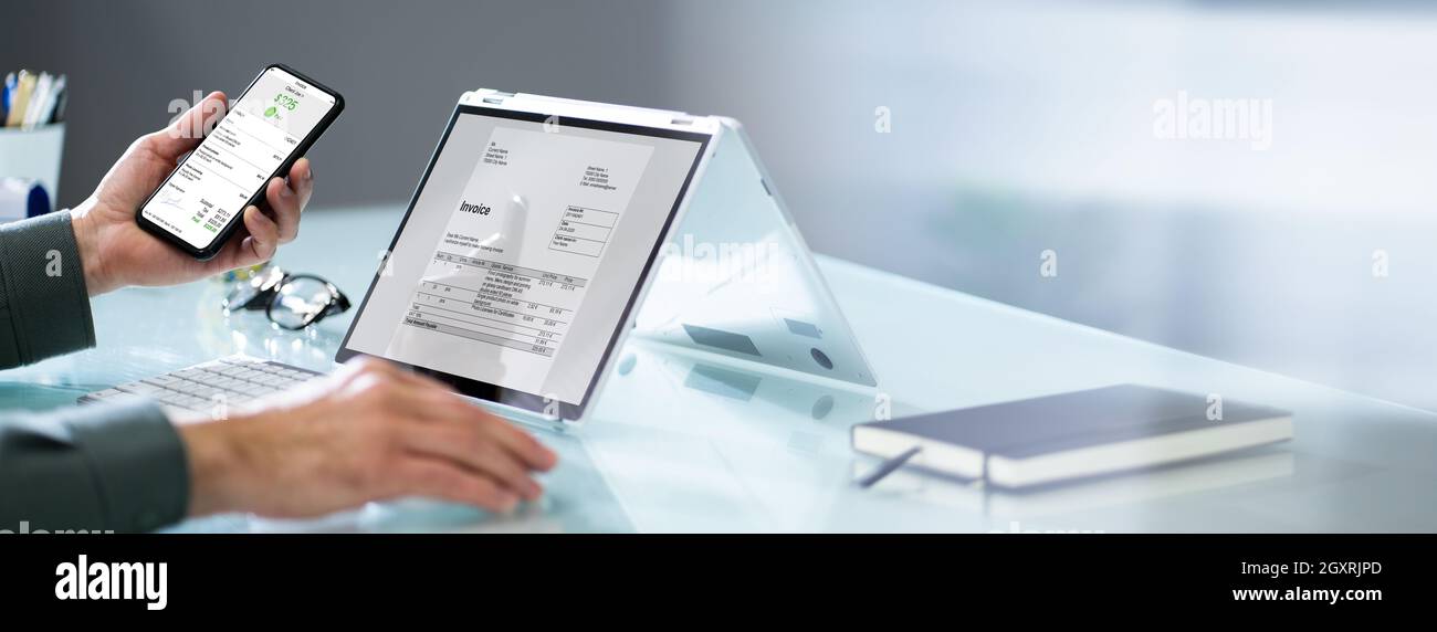 Accountant Checking Online Invoice On Tablet Screen Stock Photo