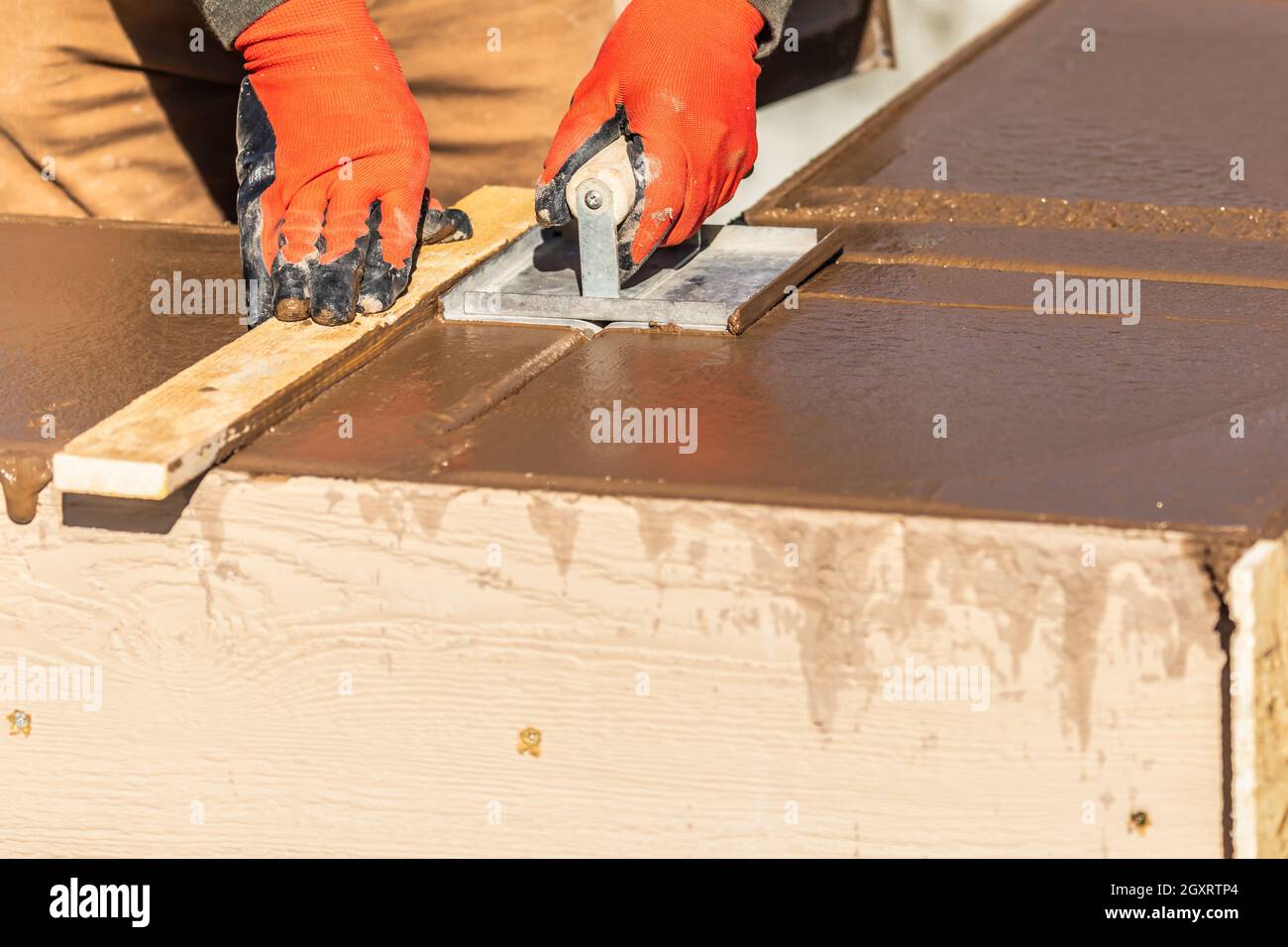 Using A Groover Construction Worker Using Hand Groover On Wet Cement Forming Coping ...