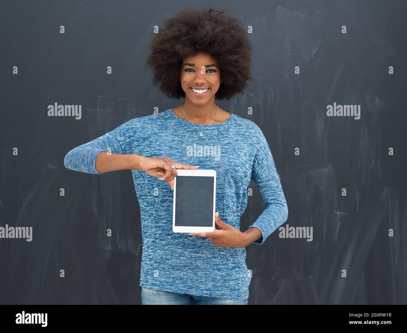 Young Happy African American Woman Using Digital Tablet Isolated on a ...