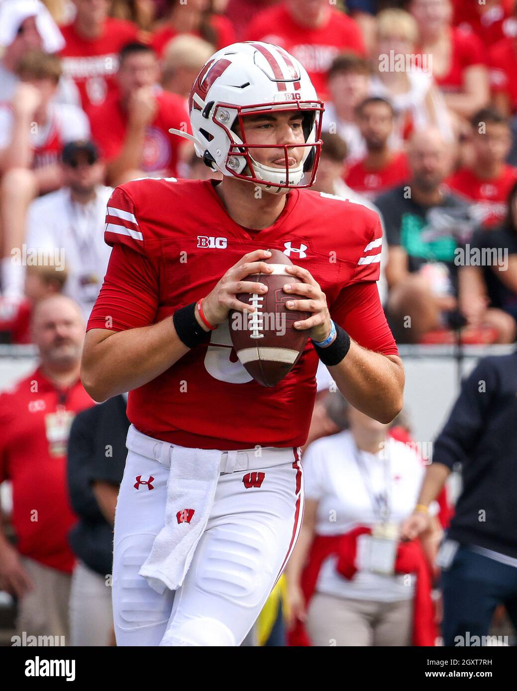 October 02, 2021: Wisconsin Badgers quarterback Graham Mertz (5) drops ...