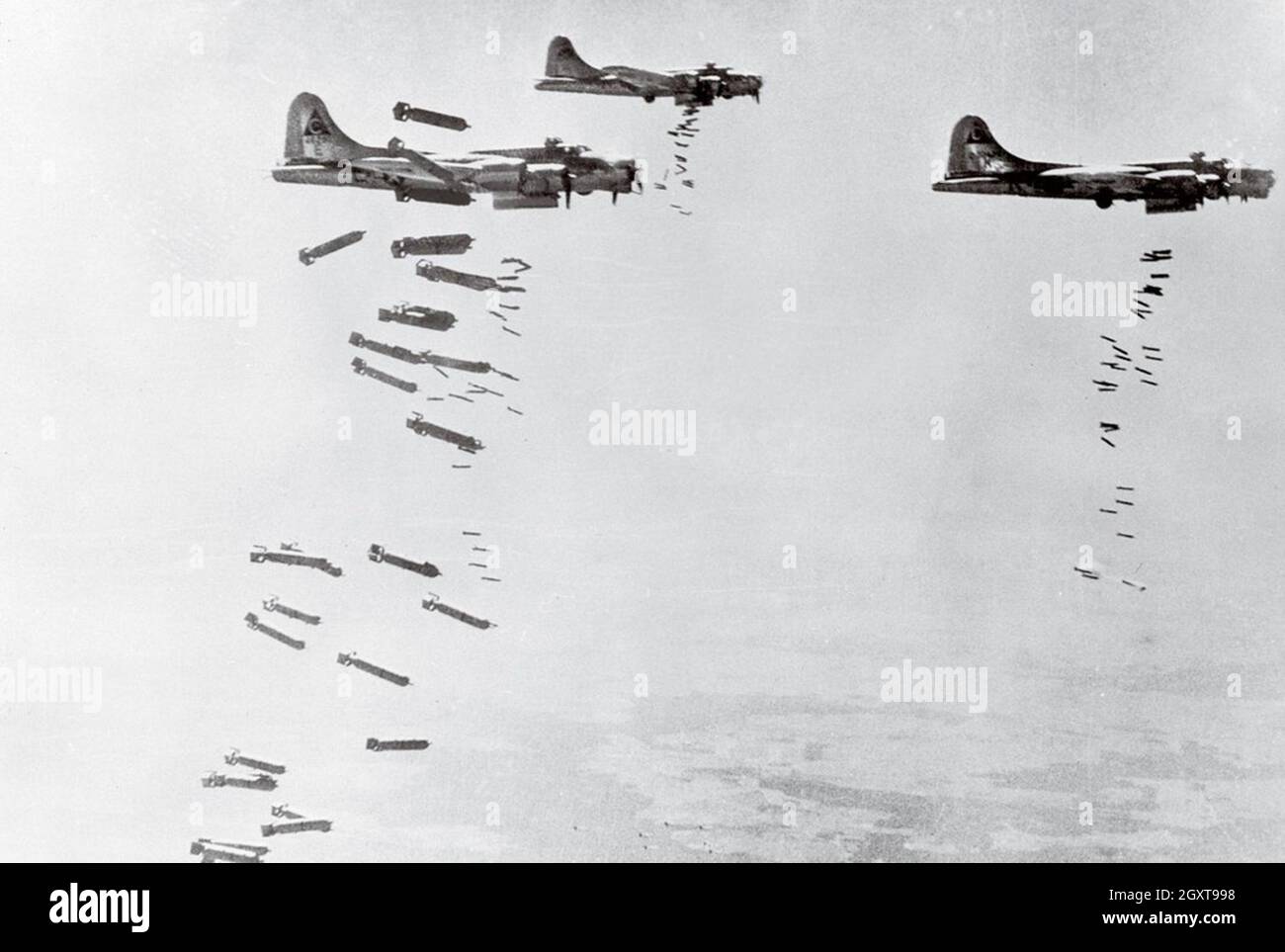 Boeing B-17 Flying Fortress bombers area bombing German cities  by radar during the combined Allied strategic bombing campaign. The USAF bombed by day and the RAF bombed by night. Stock Photo