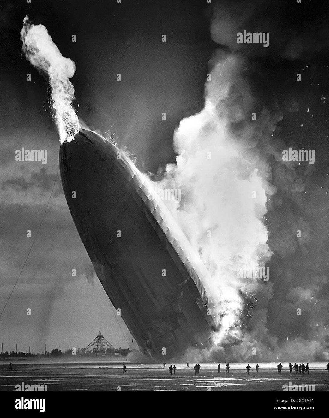 The airship Hindenburg in flames on landing at Lakehurst Naval Station inManchester Township, USA on the 6th May 1937 Stock Photo