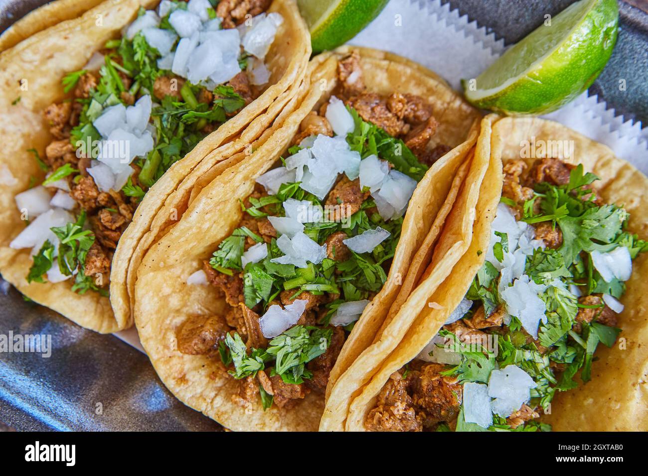 Close up of Authentic Mexican taco steak with onions, cilantro, and lime Stock Photo